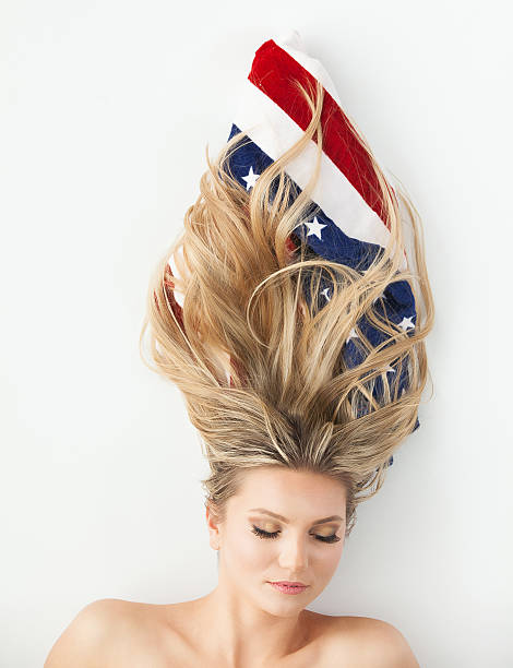 istock Beautiful woman with American flag 506246030