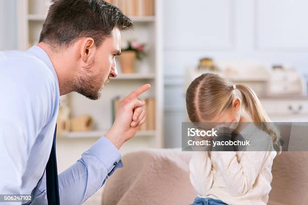 Strict Father Punishing His Daughter Stock Photo - Download Image Now - Child, Photography, Punishment