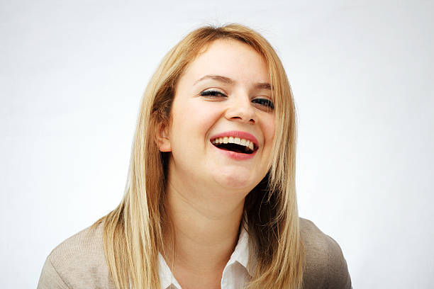 istock Beautiful young woman smiling 506247788