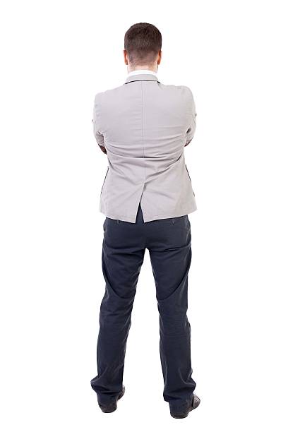 istock back view of Business man  looks. 506248738