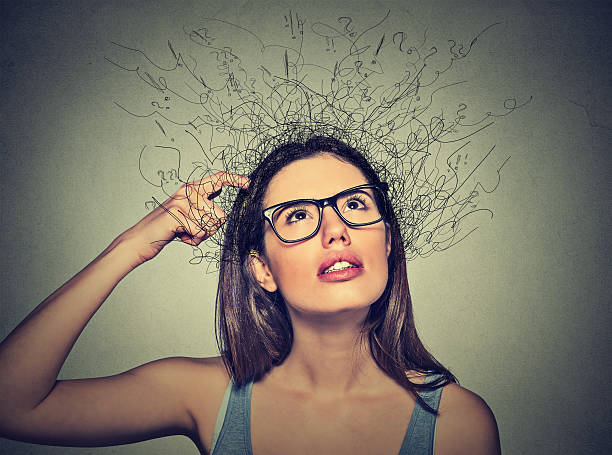 woman scratching head, thinking brain melting into lines