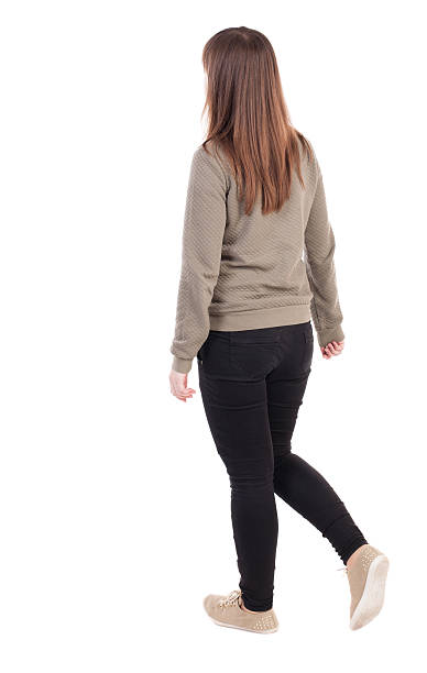 side view of walking woman in jeans. beautiful girl side view of walking woman in jeans. beautiful girl in motion. backside view of person. Rear view people collection. Isolated over white background. pics of girls buttocks stock pictures, royalty-free photos & images