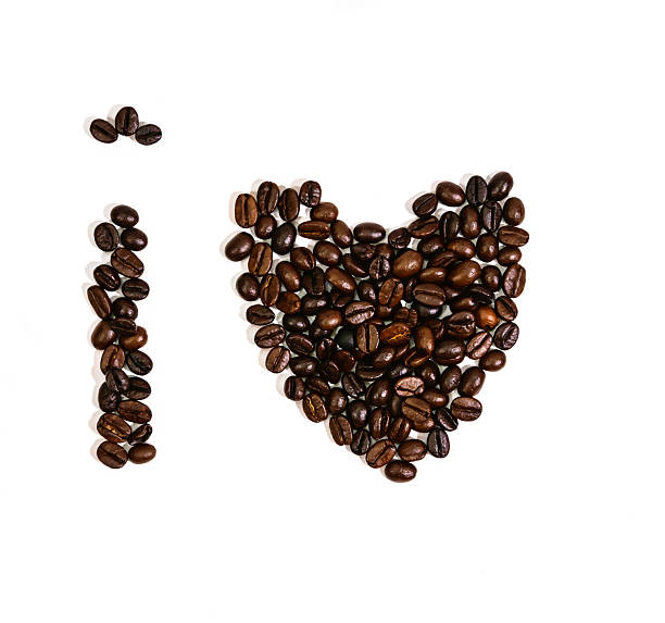 istock Coffee bean heart shape on white isolated 506284495