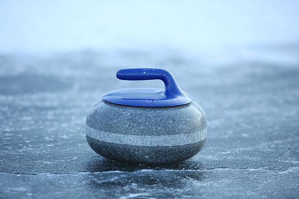 istock granite stones for curling on ice 506284560
