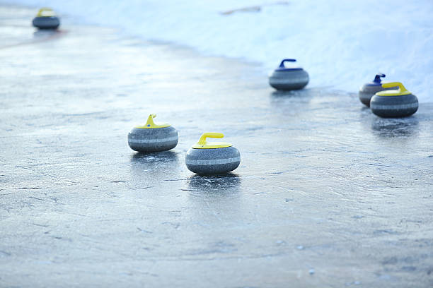 istock granite stones for curling on ice 506284612