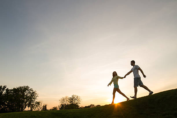 istock Silhouette of a young couple. 506287356