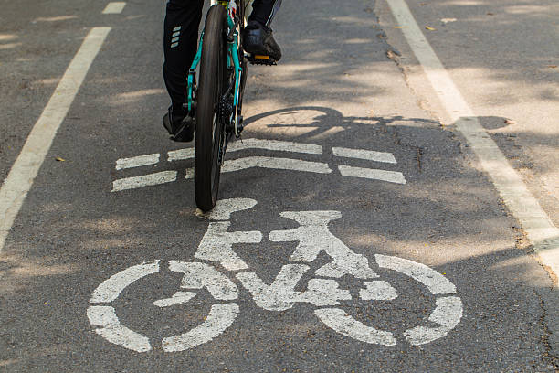 istock Bicyclist in bike lane 506287659