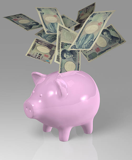 istock Yen piggy bank notes 506288061