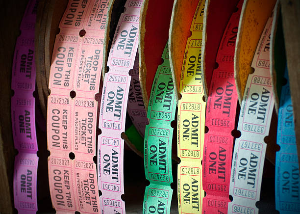Admit One Key West, FL, USA - January 6, 2010: Rolls of multicolored admission tickets outside the Ernest Hemingway House. The Ernest Hemingway House is the former residence of the famous author. box office photos stock pictures, royalty-free photos & images