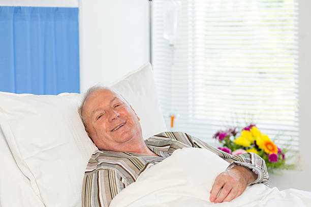 istock Senior man in hospital bed 506289111