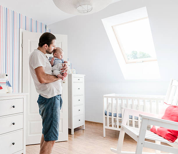 istock Father looking after his little son, affectionately speaking to him 506289133