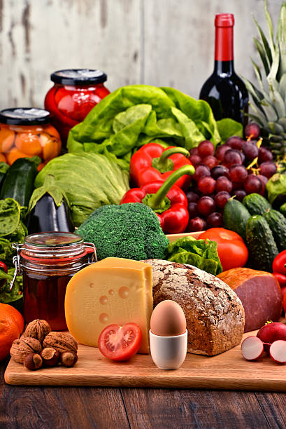 istock Organic food including vegetables fruit bread dairy and meat 506290058