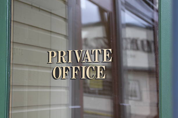 istock Private Office - Sign On A Glass Door 506296168