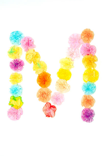 istock “M” Alphabet flowers made from paper craftwork 506296472