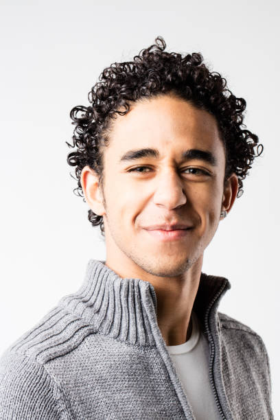 istock funny face of a young smiling man 506297570
