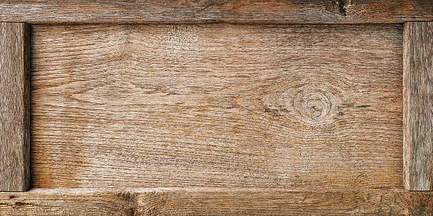 istock Old wooden framed board background. 506315186