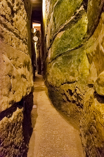 View on a tunnel under the Western Wall of the Old Jerusalem, Israel. It is the center of Jewish yearning and memory for more than 2,000 years; artificially illuminated tunnel has a length of 488 meters