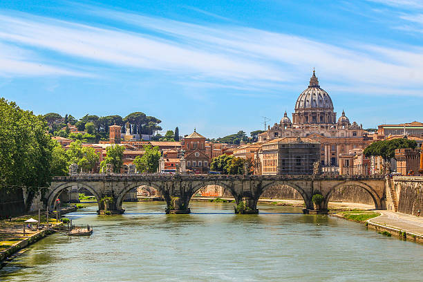 St. Peter's Cathedral with Ponte Sant'Angelo, Rome Scene of St. Peter's Cathedral with Ponte Sant'Angelo, Rome. dome tent photos stock pictures, royalty-free photos & images
