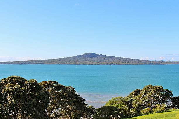 Rangitoto Volcanic Island taken from high up on top of North Head Historic Reserve.  Taken on a beautiful spring day with plenty of sunshine and blue skies