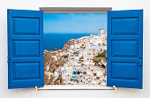 Panoramic view of city in Oia at Santorini, Greece