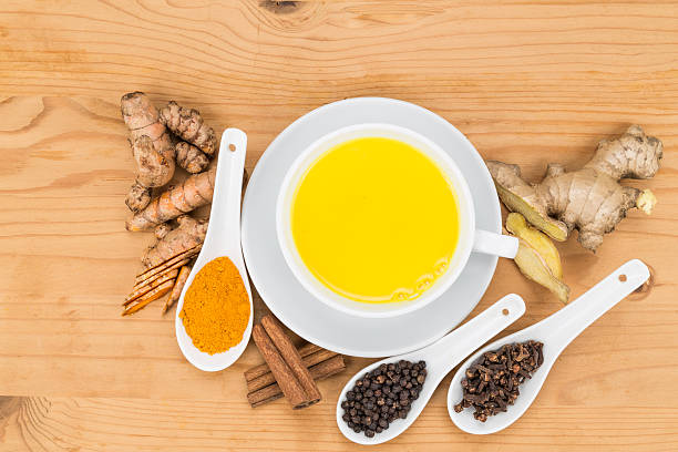 istock Healthy turmeric milk tea with ginger, cinnamon, cloves, black p 506317678