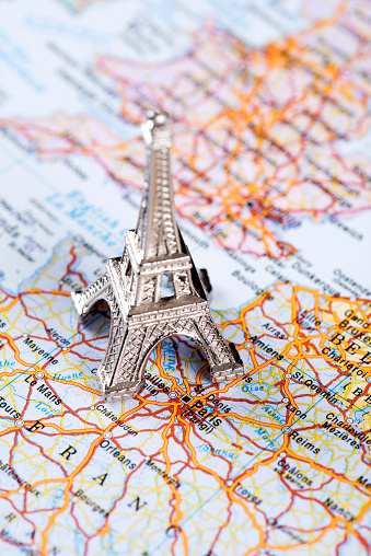 Map of Paris, France with Eiffel Tower. Detail from the World Atlas.
