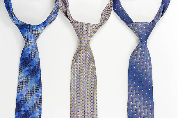 istock Group of colorful neckties on white 506318408