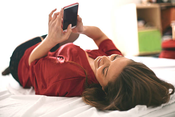 istock Girl texting on smartphone 506320358