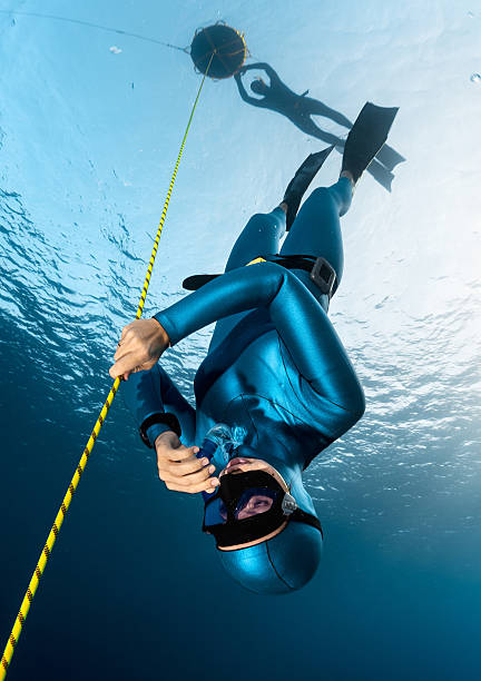 istock Freedivers in the sea 506321178