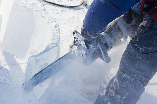 chabarowsk, russland - 23. januar 2016: ice sculpture wettbewerb - ice carving sculpture chisel stock-fotos und bilder