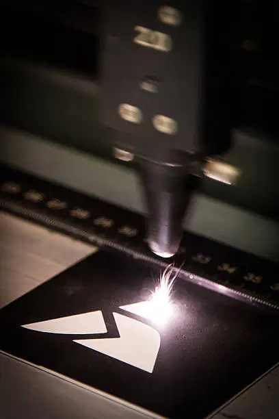 Laser engraving logo on metal plate