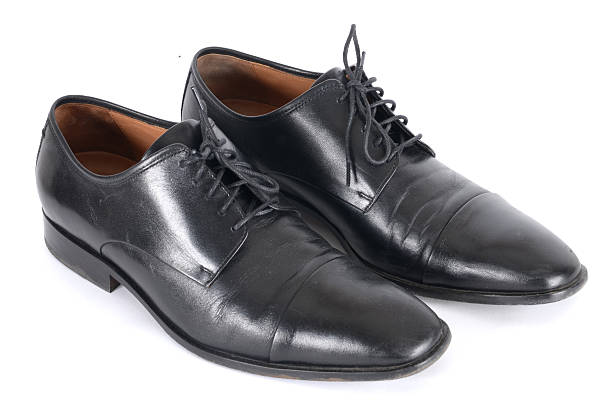 istock The black shoes isolated on white background. 506323330