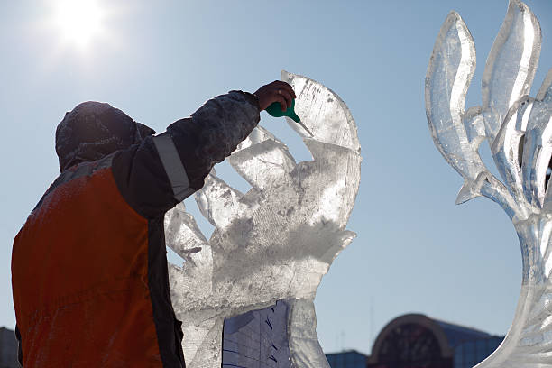 chabarowsk, russland - 23. januar 2016: ice sculpture wettbewerb - ice carving sculpture chisel stock-fotos und bilder