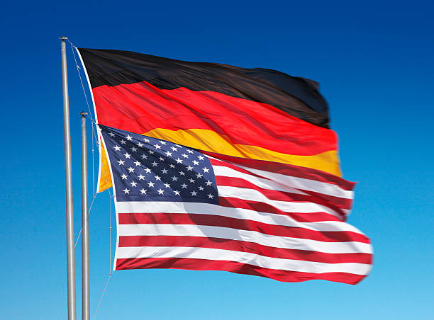 istock Flag og Germany and USA waving together 506324944