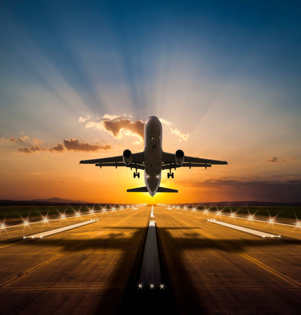 istock Passenger airplane taking off at sunset 506325008