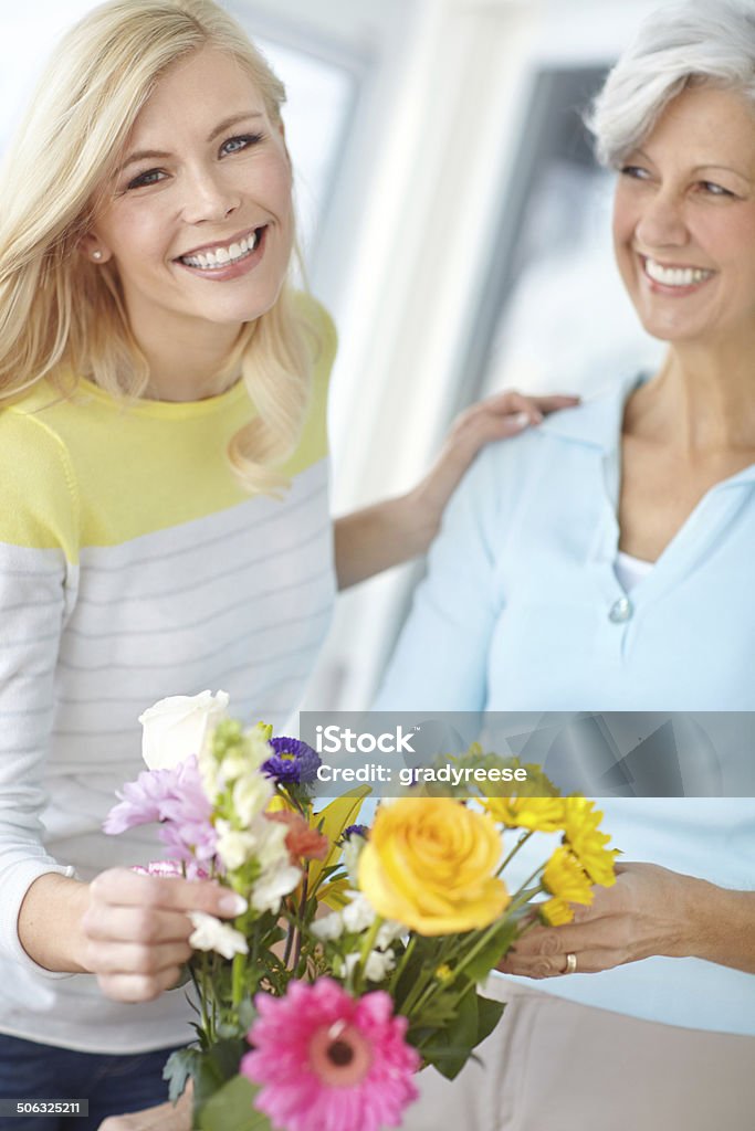 My mom knows how to make beautiful things Portrait of a young woman enjoying some flower arranging with her mother 30-39 Years Stock Photo