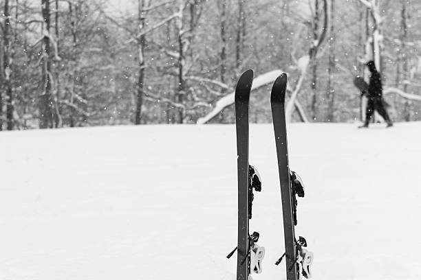 istock Ski in the snow. Skier is passing with his snowboard 506325374