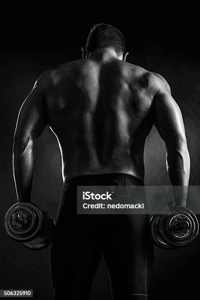 Weight Lifting Training Stock Photo - Download Image Now - Back, Men, Rear View