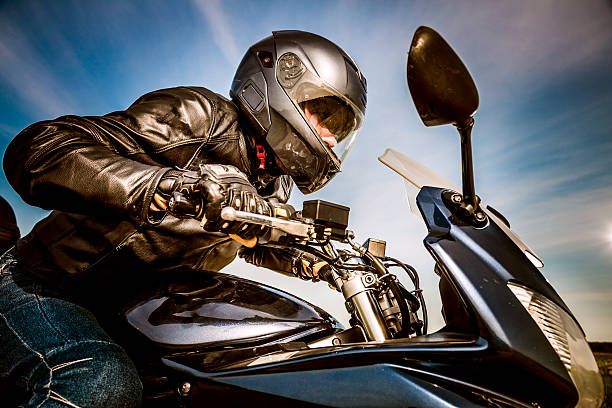 istock Biker racing on the road 506327492