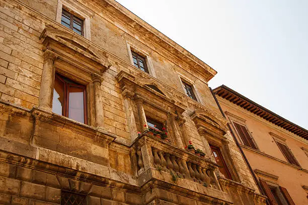 The front of buildings in Cortona, Italy, Tuscany. Shoot by sunlight