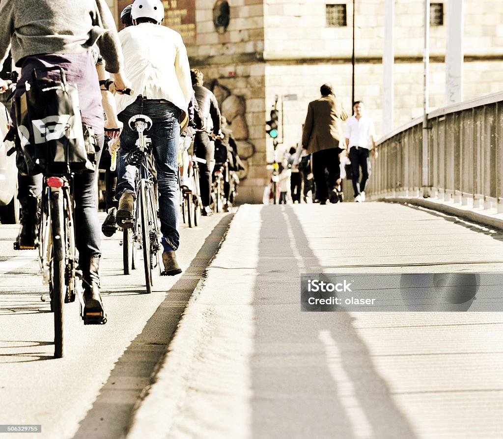 Bikes in traffic Spring  day in environment friendly Stockholm. Bikes in bike lane. Adult Stock Photo