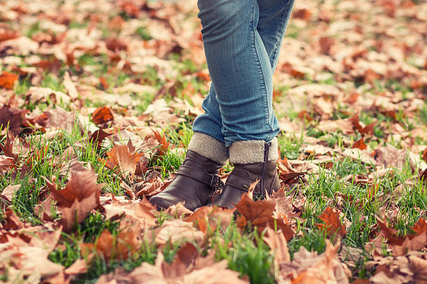 istock Woman legs in boots 506330772
