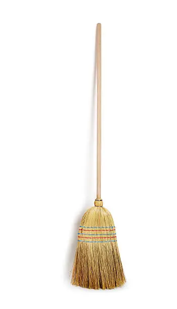 close up of an old broom new broom isolated white background with drop shadow,image has a  clipping path