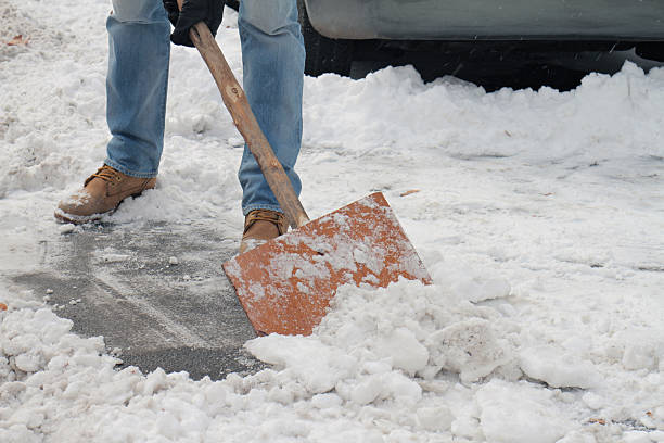istock Man shoveling snow close up. 506330924