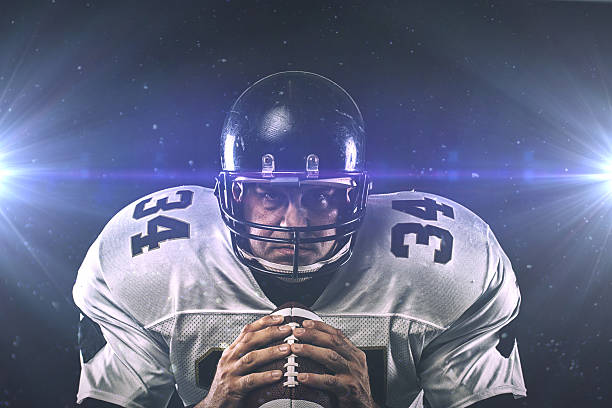 istock head on with football player 506332875