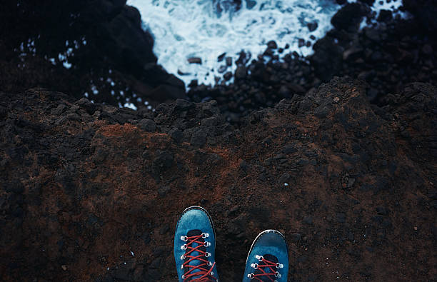 istock top view blue trekking shoes on the edge 506340364