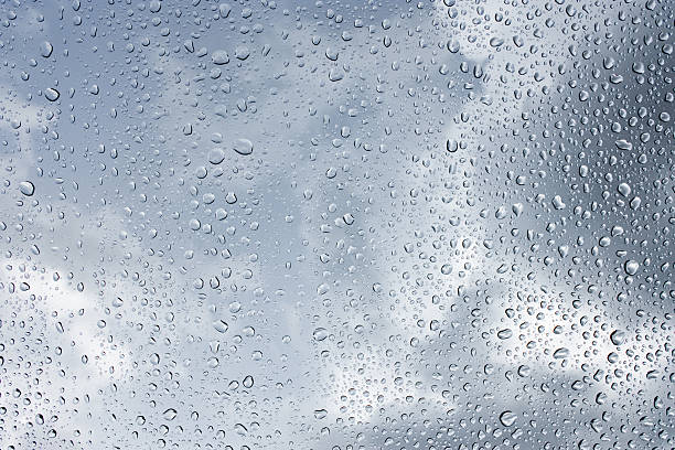istock Drops of rain on glass , rain drops on clear window 506341264