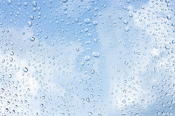 istock Drops of rain on glass , rain drops on clear window 506341272