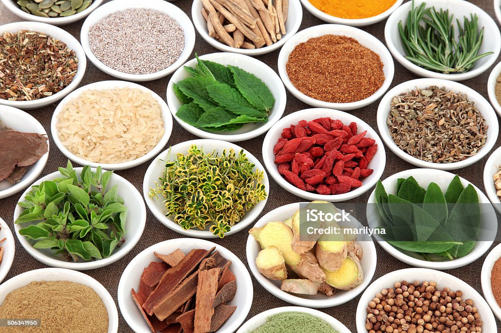 Super Food for Mens Health Herb, spice and super food selection for mens health in porcelain bowls over hessian background. Used in natural alternative herbal medicine. Selective focus. Alternative Medicine Stock Photo