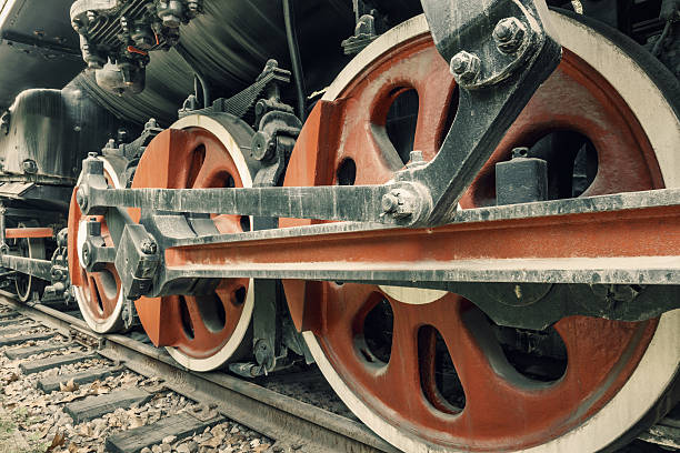 istock Wheels of vintage steam train 506345032